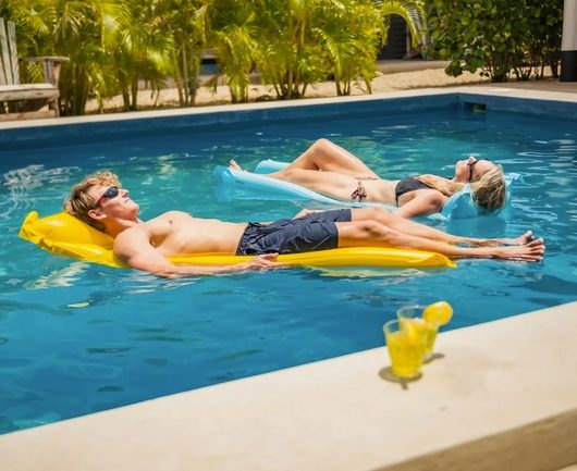 swimming pool with guest at Kura Kabana Bonaire