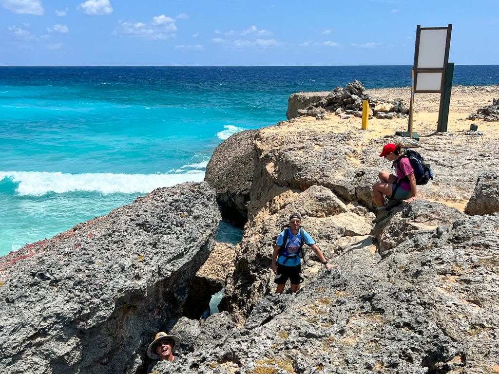 climb down a cliff in Washington Slagbaai national park